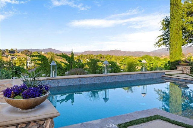 33260 Susan Grace Ct, Temecula, CA 92592 - outdoor pool with a mountain view