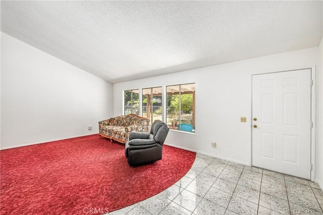 9780 Almeria Ave, Fontana, CA 92335 - living area with a textured ceiling and lofted ceiling