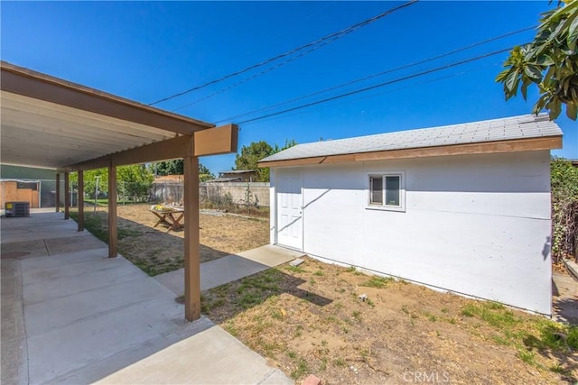 9780 Almeria Ave, Fontana, CA 92335 - fenced backyard with an outdoor structure and a patio area