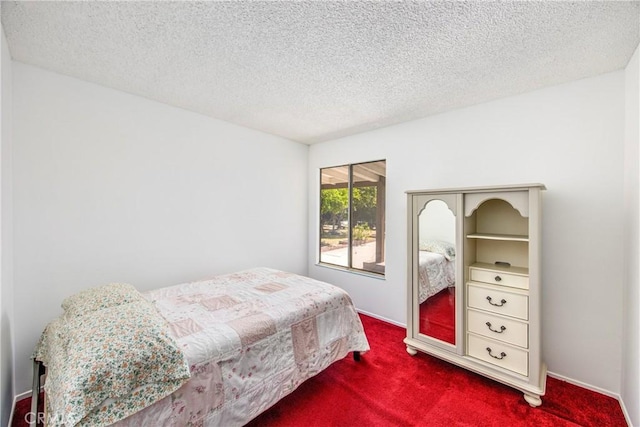 9780 Almeria Ave, Fontana, CA 92335 - bedroom featuring dark carpet and a textured ceiling