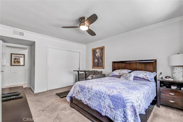 1203 N Sweetzer Ave Unit 215, West Hollywood, CA 90069 - carpeted bedroom featuring crown molding, a closet, and a ceiling fan