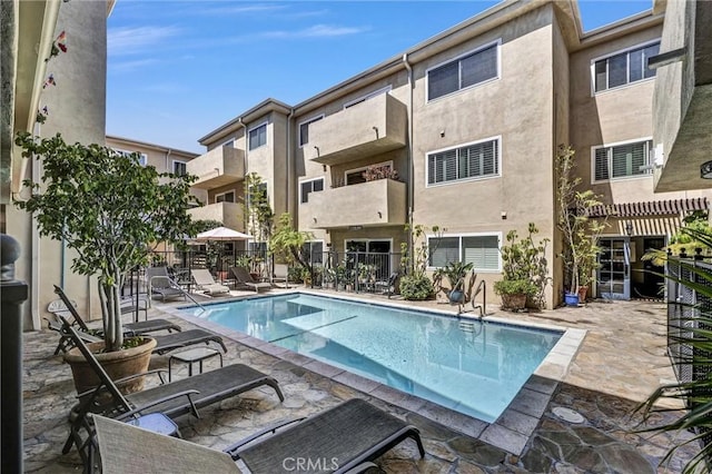 1203 N Sweetzer Ave Unit 215, West Hollywood, CA 90069 - community pool featuring a patio