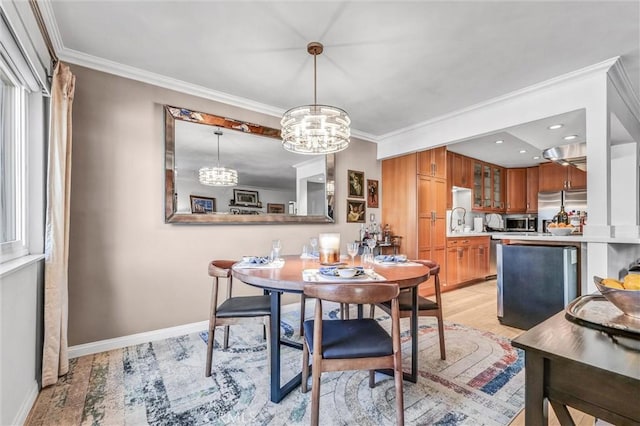1203 N Sweetzer Ave Unit 215, West Hollywood, CA 90069 - dining area featuring a chandelier, ornamental molding, light wood-style flooring, and recessed lighting