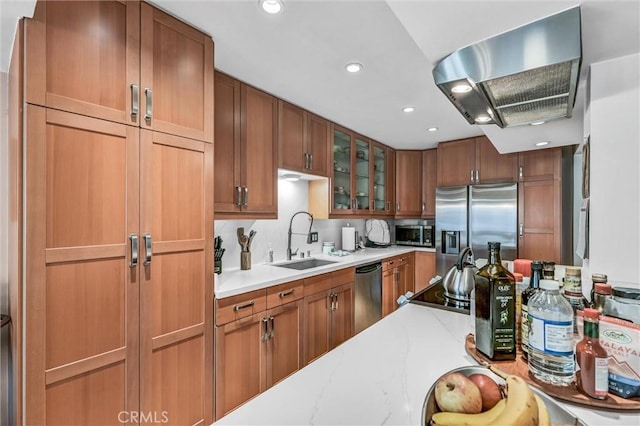 1203 N Sweetzer Ave Unit 215, West Hollywood, CA 90069 - kitchen with wall chimney exhaust hood, stainless steel appliances, glass insert cabinets, brown cabinets, and recessed lighting