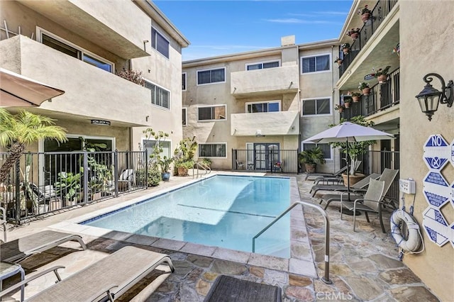 1203 N Sweetzer Ave Unit 215, West Hollywood, CA 90069 - community pool featuring a patio