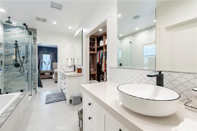 23670 Shirwaun, Apple Valley, CA 92307 - bathroom with a stall shower, plenty of natural light, vanity, and recessed lighting