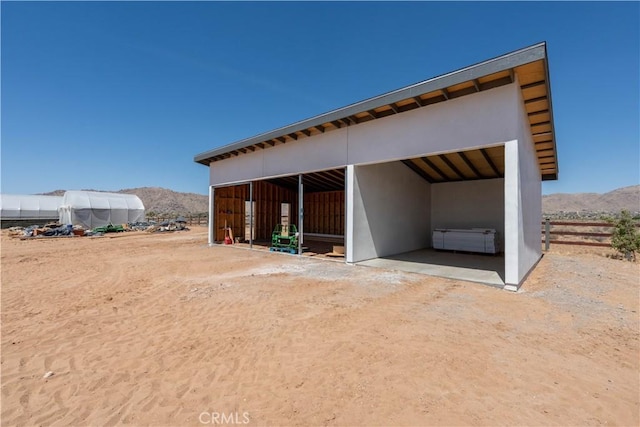23670 Shirwaun, Apple Valley, CA 92307 - view of outbuilding featuring a mountain view and an exterior structure