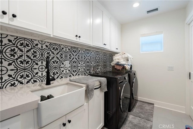 23670 Shirwaun, Apple Valley, CA 92307 - laundry area featuring washing machine and dryer, recessed lighting, cabinet space, and tile patterned flooring
