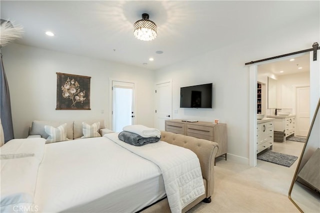 23670 Shirwaun, Apple Valley, CA 92307 - bedroom featuring a barn door, recessed lighting, light carpet, a chandelier, and ensuite bath