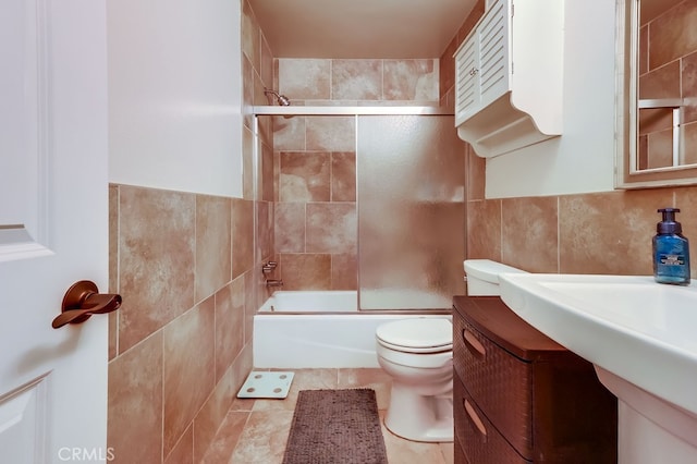 12200 Montecito Rd Unit C103, Seal Beach, CA 90740 - bathroom featuring tile walls, enclosed tub / shower combo, and vanity