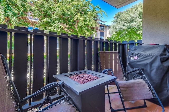 12200 Montecito Rd Unit C103, Seal Beach, CA 90740 - view of patio / terrace featuring a fire pit