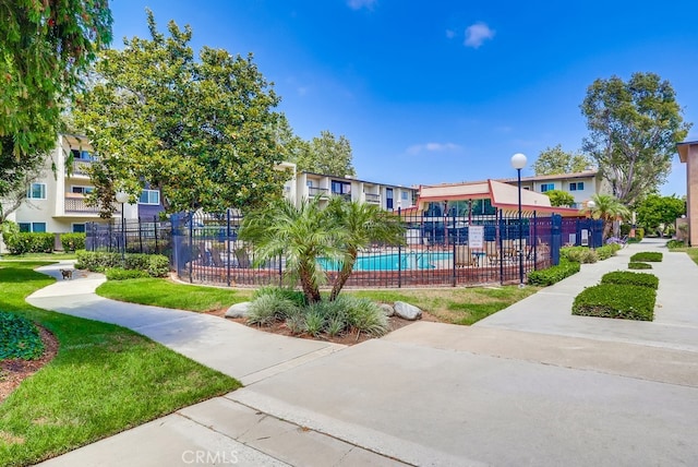 12200 Montecito Rd Unit C103, Seal Beach, CA 90740 - view of home's community with a swimming pool