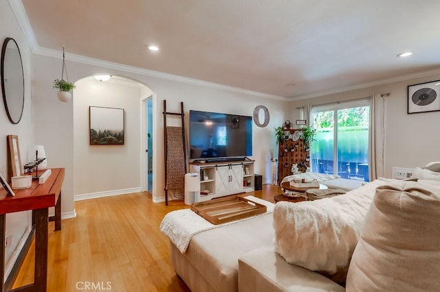 12200 Montecito Rd Unit C103, Seal Beach, CA 90740 - living area featuring arched walkways, light wood finished floors, crown molding, and recessed lighting