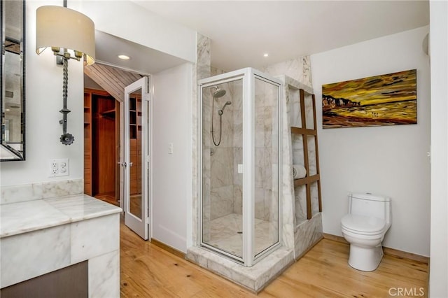 426 Nyes Pl, Laguna Beach, CA 92651 - full bath featuring wood finished floors, a shower stall, recessed lighting, and vanity