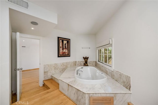 426 Nyes Pl, Laguna Beach, CA 92651 - bathroom with a bath, wood finished floors, and recessed lighting