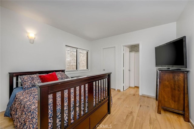 426 Nyes Pl, Laguna Beach, CA 92651 - bedroom with light wood-style floors