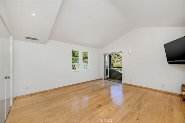 426 Nyes Pl, Laguna Beach, CA 92651 - unfurnished living room featuring lofted ceiling and wood finished floors
