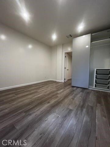 401 W Harvard St, Glendale, CA 91204 - basement with dark wood-type flooring and baseboards