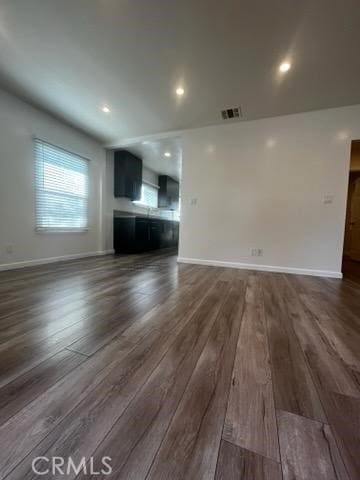 401 W Harvard St, Glendale, CA 91204 - unfurnished living room featuring dark wood-style floors and recessed lighting
