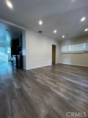 401 W Harvard St, Glendale, CA 91204 - unfurnished living room with dark wood-type flooring and recessed lighting