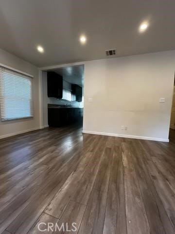 401 W Harvard St, Glendale, CA 91204 - unfurnished living room with dark wood-type flooring and recessed lighting