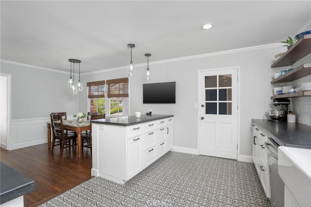 109 Via Ardilla, Palos Verdes Estates, CA 90274 - kitchen featuring open shelves, dark countertops, a peninsula, white cabinetry, and pendant lighting