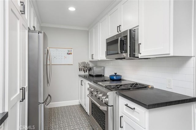 109 Via Ardilla, Palos Verdes Estates, CA 90274 - kitchen featuring stainless steel appliances, dark countertops, white cabinetry, backsplash, and ornamental molding