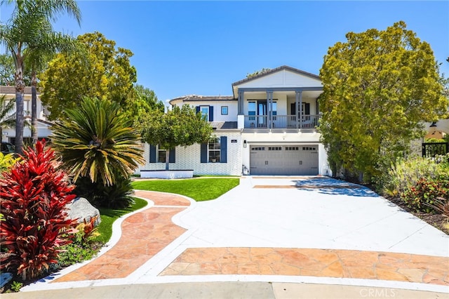 1 Tularosa Ct, Aliso Viejo, CA 92656 - view of front of home featuring a garage, concrete driveway, and a balcony