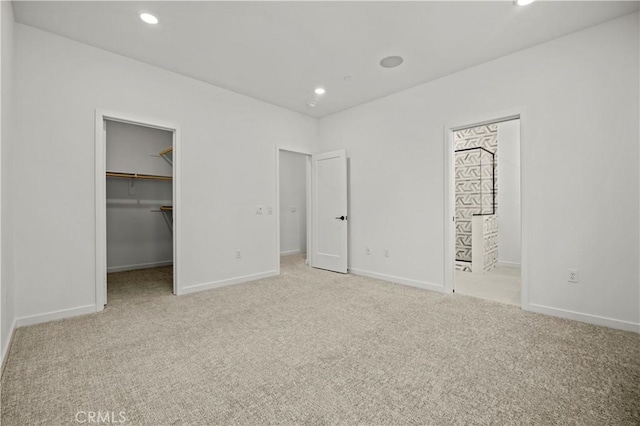 1080 Foothill Blvd, Claremont, CA 91711 - unfurnished bedroom with carpet floors, a spacious closet, recessed lighting, ensuite bath, and a closet