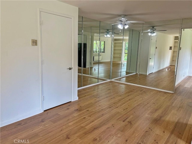 911 Ronda Sevilla Unit D, Laguna Woods, CA 92637 - spare room featuring a ceiling fan and wood finished floors