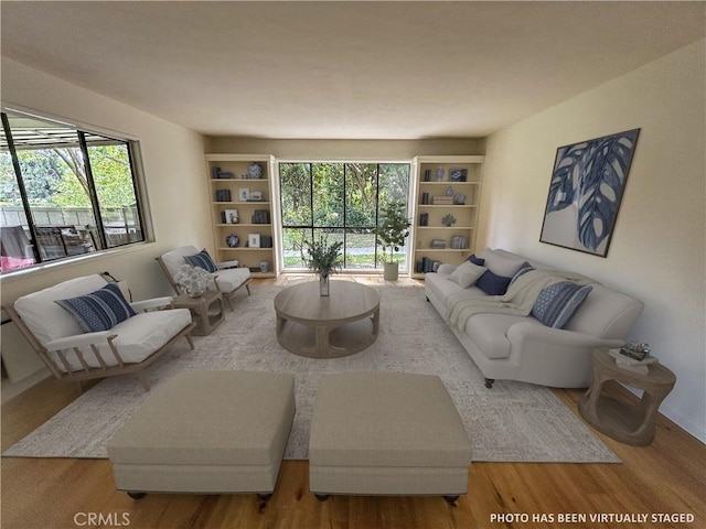 911 Ronda Sevilla Unit D, Laguna Woods, CA 92637 - living room featuring wood finished floors