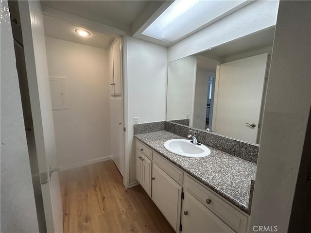 911 Ronda Sevilla Unit D, Laguna Woods, CA 92637 - bathroom with wood finished floors and vanity