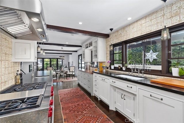 282 Argonne Ave, Long Beach, CA 90803 - kitchen featuring wall chimney exhaust hood, dark countertops, white cabinetry, beam ceiling, and recessed lighting