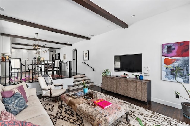 282 Argonne Ave, Long Beach, CA 90803 - living room featuring wood finished floors, beamed ceiling, arched walkways, a chandelier, and stairs