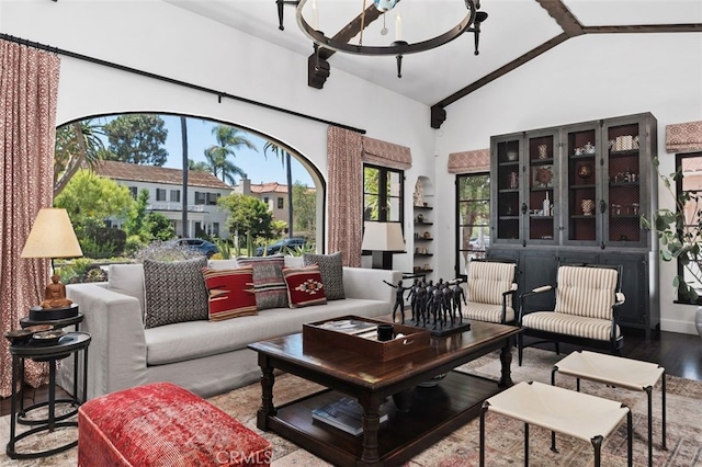 282 Argonne Ave, Long Beach, CA 90803 - living area featuring wood finished floors, healthy amount of natural light, a chandelier, and high vaulted ceiling