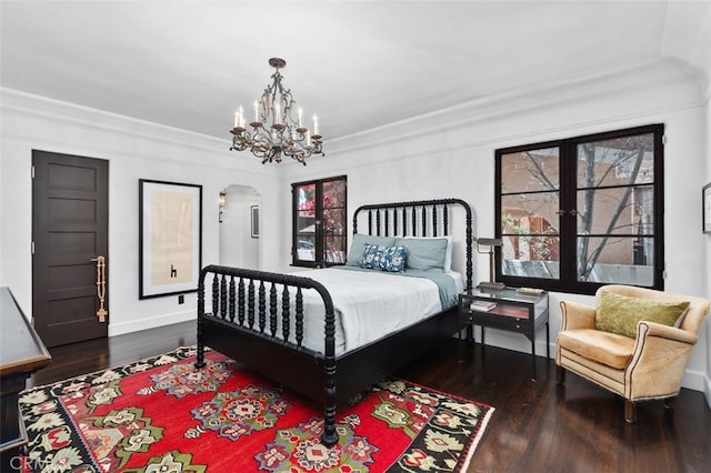 282 Argonne Ave, Long Beach, CA 90803 - bedroom featuring wood finished floors, a chandelier, and arched walkways