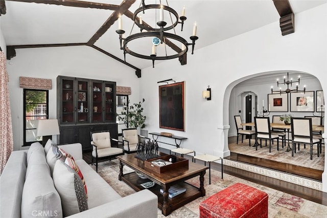 282 Argonne Ave, Long Beach, CA 90803 - living area featuring a chandelier, arched walkways, and wood finished floors
