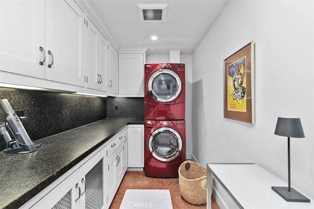 282 Argonne Ave, Long Beach, CA 90803 - laundry room featuring stacked washer / dryer and cabinet space