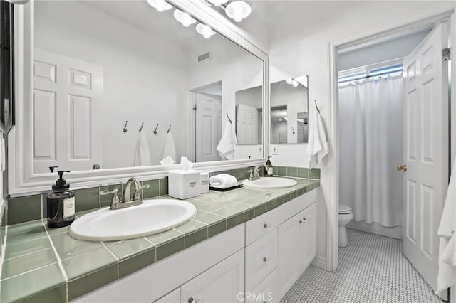 11 Heartwood Way, Aliso Viejo, CA 92656 - bathroom featuring double vanity and toilet