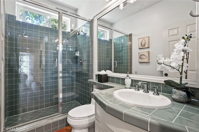 11 Heartwood Way, Aliso Viejo, CA 92656 - bathroom with vanity, a stall shower, and plenty of natural light
