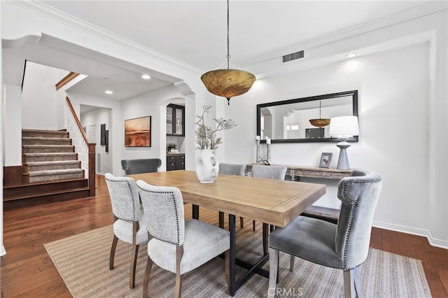 11 Heartwood Way, Aliso Viejo, CA 92656 - dining area featuring hardwood / wood-style flooring, stairway, recessed lighting, and crown molding