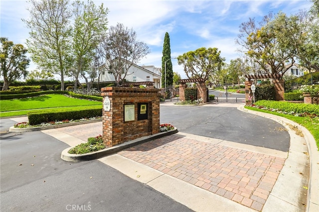 11 Heartwood Way, Aliso Viejo, CA 92656 - view of asphalt street featuring curbs, a gate, a gated entry, and sidewalks