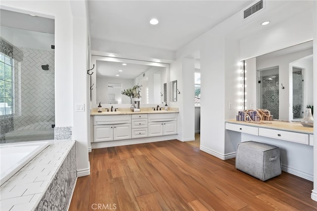 11 Heartwood Way, Aliso Viejo, CA 92656 - full bath with double vanity, wood finished floors, a stall shower, a bath, and recessed lighting
