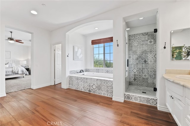 11 Heartwood Way, Aliso Viejo, CA 92656 - full bathroom with wood finished floors, vanity, a bath, a shower stall, and recessed lighting