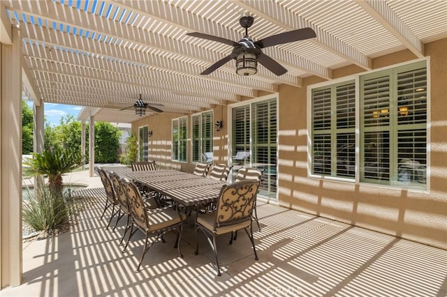 79787 Parkway Esplanade N, La Quinta, CA 92253 - view of patio featuring ceiling fan, a pergola, and outdoor dining area