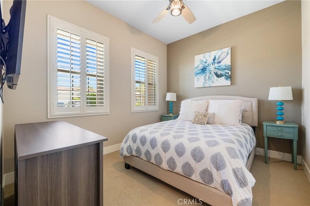 79787 Parkway Esplanade N, La Quinta, CA 92253 - bedroom with light carpet and ceiling fan