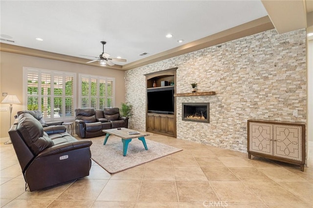 79787 Parkway Esplanade N, La Quinta, CA 92253 - tiled living room featuring ceiling fan, built in shelves, a fireplace, and recessed lighting