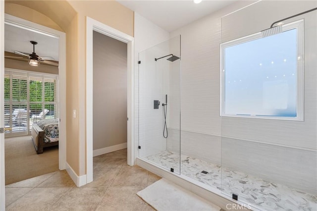 79787 Parkway Esplanade N, La Quinta, CA 92253 - full bath with connected bathroom, tiled shower, ceiling fan, and tile patterned flooring