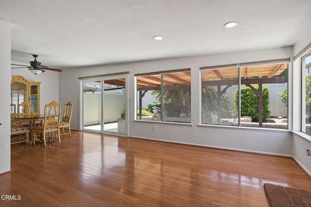 27127 Rio Bosque Dr, Valencia, CA 91354 - unfurnished dining area featuring hardwood / wood-style flooring, a ceiling fan, recessed lighting, and a textured ceiling