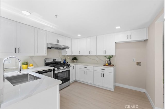 150 Diamond St Unit B, Arcadia, CA 91006 - kitchen featuring gas range, under cabinet range hood, light stone countertops, white cabinets, and recessed lighting